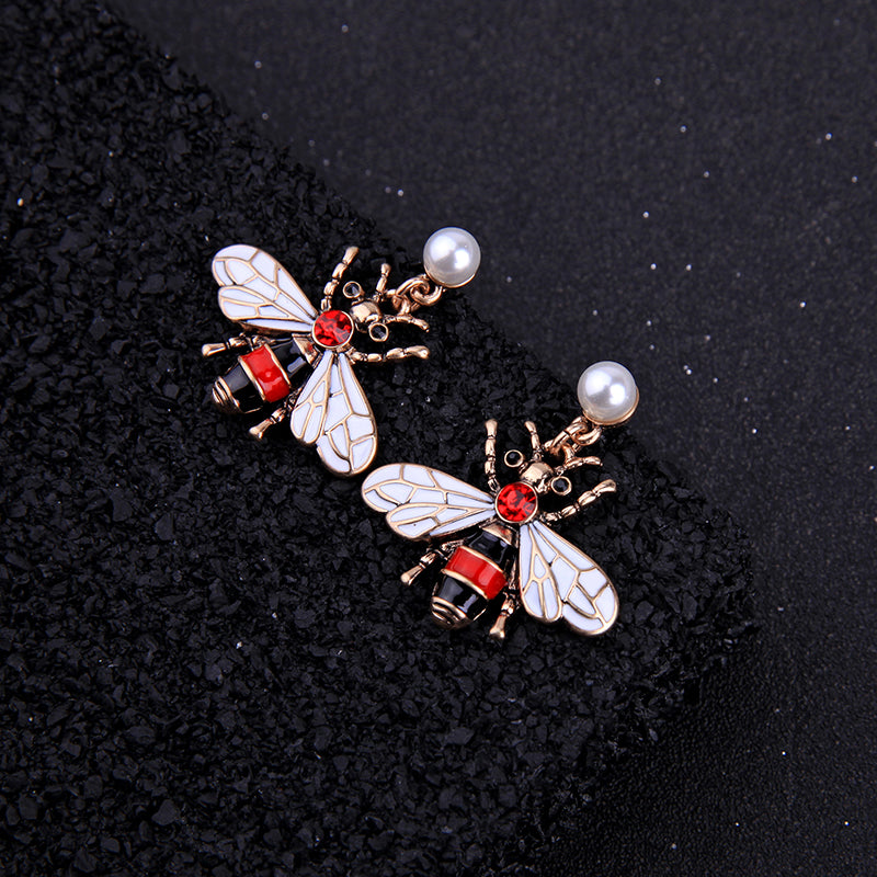 Enamel bee earrings top