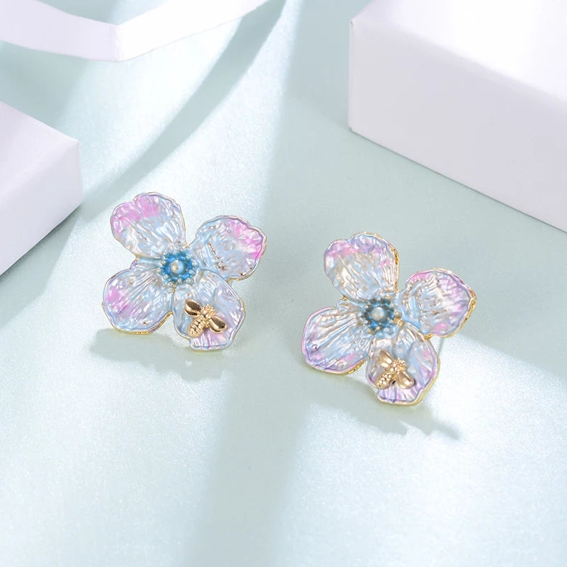Flower Blue earring with pink tint