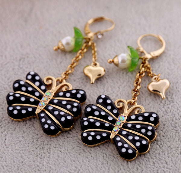 Black Hand Embroidered Dangler Butterfly Earrings Design by Jyo Das  Accessories at Pernia's Pop Up Shop 2024